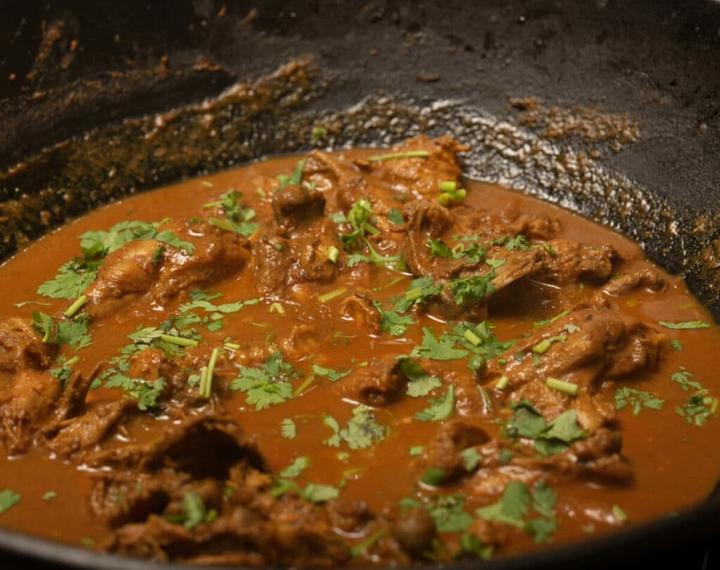 Garnish with cilantro. chicken masala curry is ready.