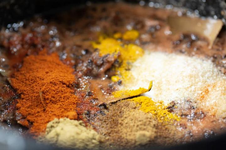 Add tomatoes and Spices